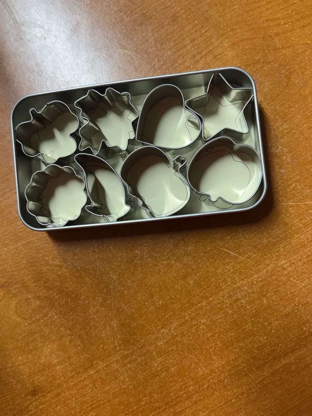 The Pampered Chef compact tin